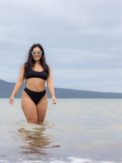 SWMR The Dip bikini bottom in black worn at the beach