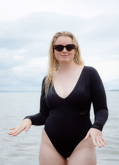 SWMR The Dip Paddle Suit in black worn in the water