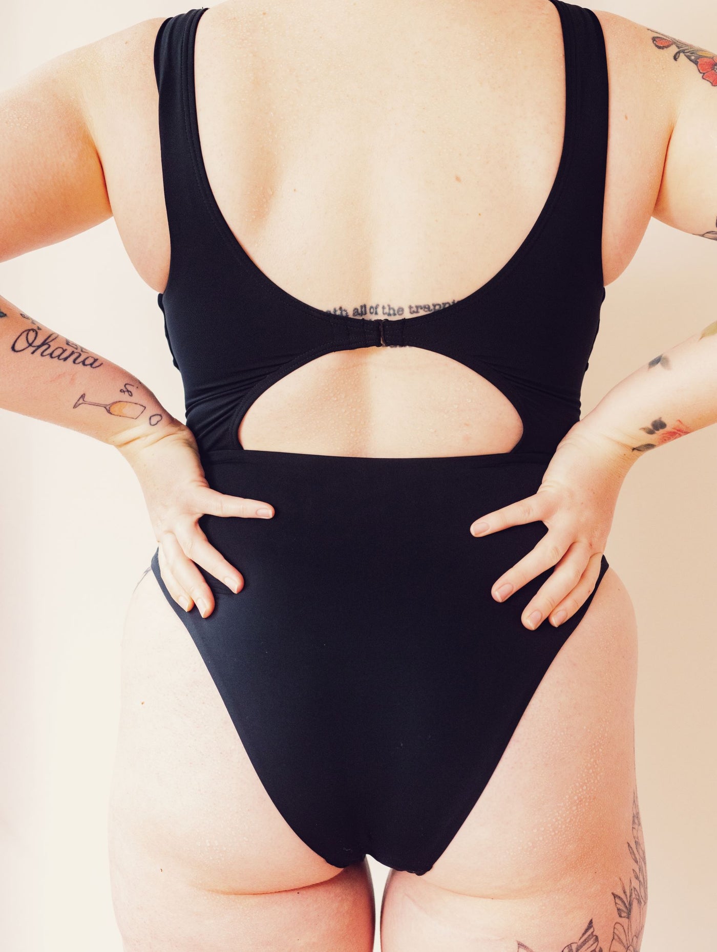 Back detailed close up view of SWMR The Dunk one piece swimsuit in black